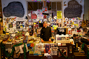 Owner Roger Stolle behind the counter at the Cat Head Blues Store.
