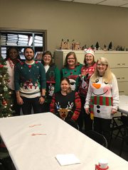 Clarksdale City Clerk, Cathy Clark, and some of the staff at the City Hall Christmas Party.