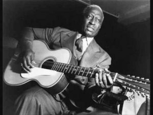 Acclaimed blues and folk musician, Lead Belly (Huddie Ledbetter).