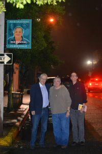 Richard Bolen, Dick Waterman and Roger Stolle under the new Dick Waterman sign in Clarksdale.