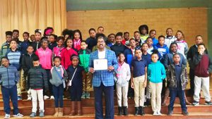 City of Clarksdale Commissioner Willie Turner Jr. visits the 4th grade class of Booker T. Washington school in Clarksdale, Mississippi.